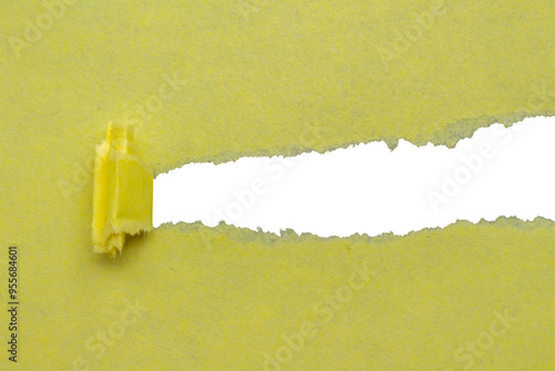 Ripped torn yellow paper on transparent background, paper cut out design element photo