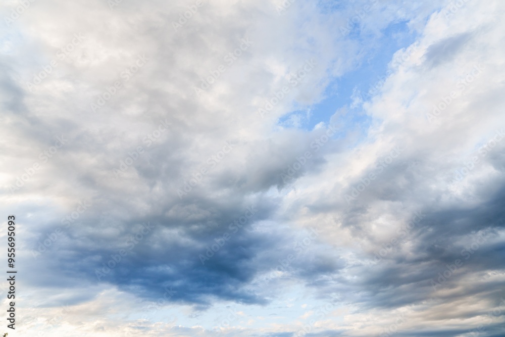 A stunning cloudscape showcasing a bright blue sky and dense white clouds illuminated by sunlight. This beautiful scene is perfect for various creative projects, adding a touch of drama and beauty. A stunning cloudscape showcasing a bright blue sky and dense white clouds illuminated by sunlight. This beautiful scene is perfect for various creative projects, adding a touch of drama and beauty.