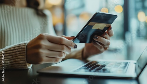 Close up of hands using smartphone for online shopping, banking, and payment transactions photo