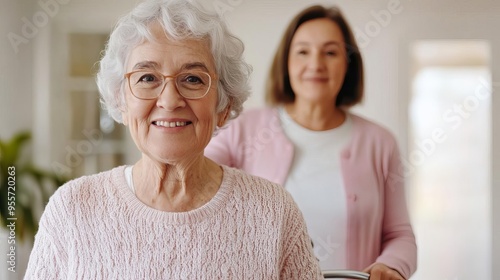 Senior woman receiving help with her walker, safe and supportive environment, bright hallway