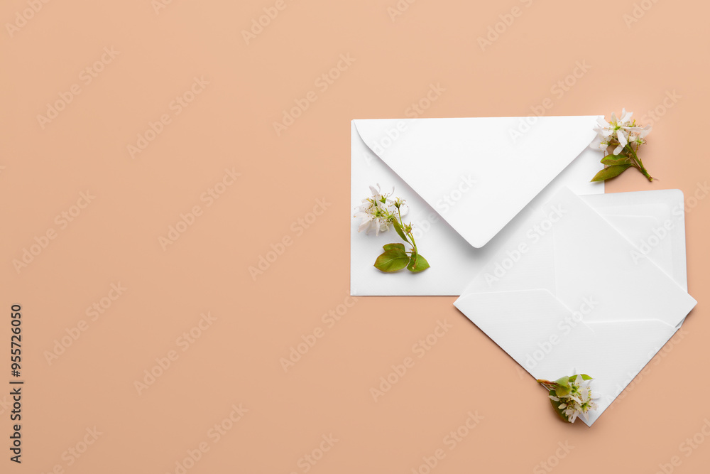 Composition with envelopes and blooming tree branches on color background Composition with envelopes and blooming tree branches on color background
