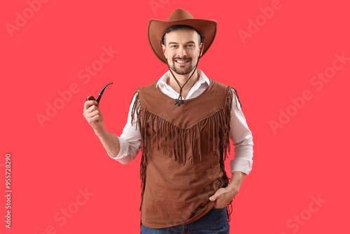 Handsome cowboy with smokin...
