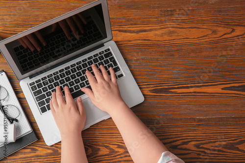 Female programmer using lap...