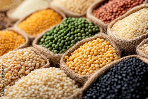 Various types of grains in bags. Perfect for illustrating food, agriculture, and healthy eating.