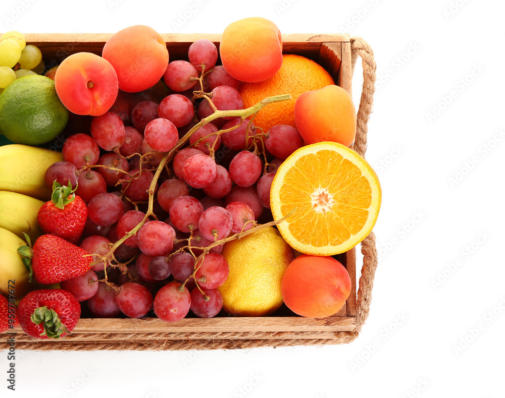 Wooden box with different fresh fruits on white background Wooden box with different fresh fruits on white background