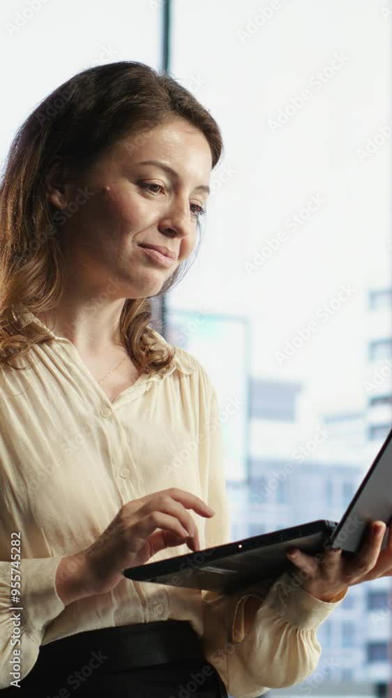 Vertical Video Determined female entrepreneur oversees a strategic review of the company activity, analyzing market trends and setting new priorities. Ensuring the enterprise objectives achievements Vertical Video Determined female entrepreneur oversees a strategic review of the company activity, analyzing market trends and setting new priorities. Ensuring the enterprise objectives achievements