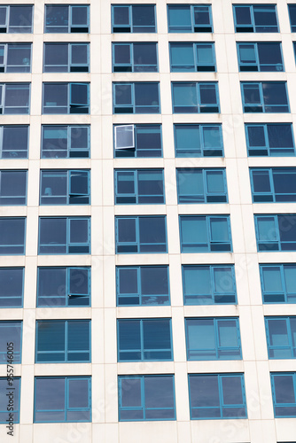 Modern facade background with window. Architecture. Building facade architecture. Building background. Window in building. Architectural detail. Background of architecture. Modern background.