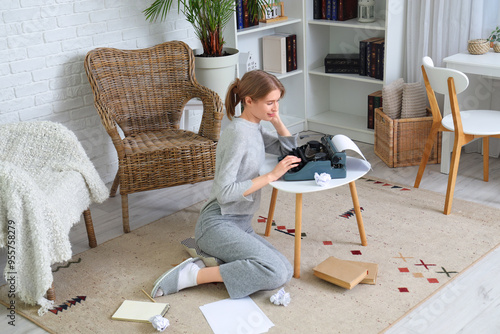Female author typing on vin...