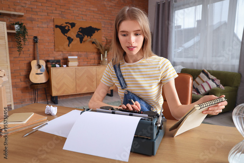 Young woman writing creativ...