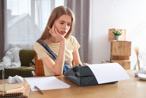 Female author typing on vin...