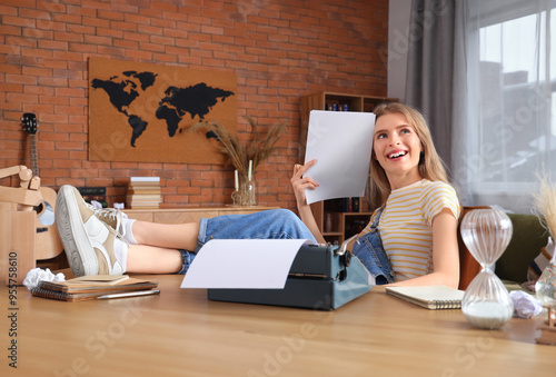 Female author with paper sh...