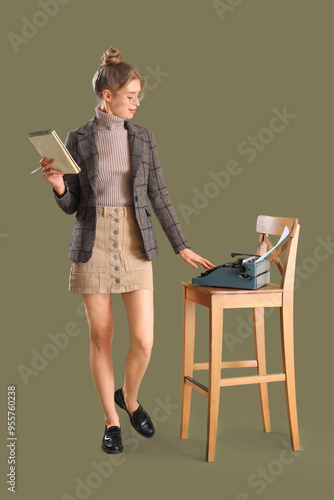 Female author with notebook...