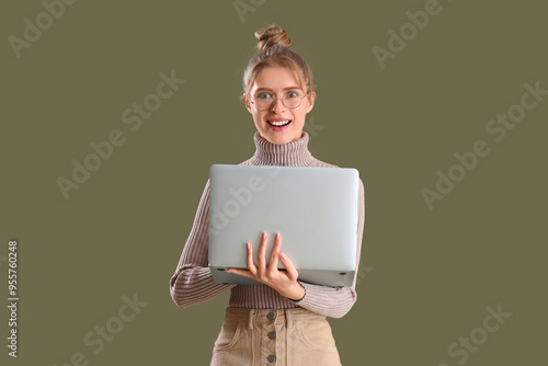 Female author with laptop o...