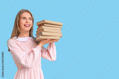 Female author with books on...