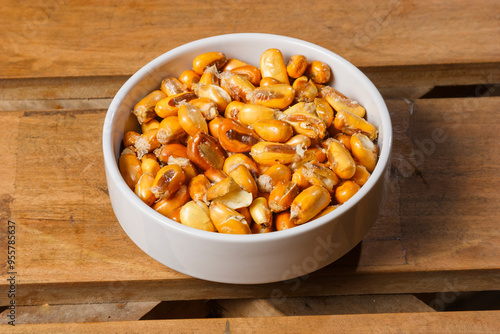 Crisp and golden roasted corn kernels served in a bowl.