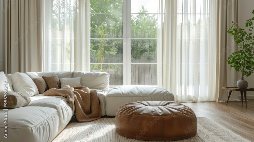 Fototapeta premium interior with many decorations, white sofa, leather pouf, long curtains next to big windows.