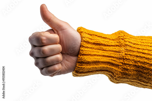 A hand with a thumbs up gesture, showcasing positivity and approval, against a clean white background. photo