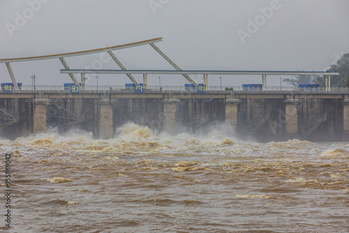 Hanam-si, Gyeonggi-do, South Korea - August 10, 2020: Flood of muddy water at the open floodgate of Paldang Dam on Han River