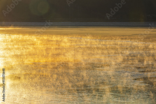 Winter and sunrise view of new born fog on the water surface of Namhan River at Dumulmeori near Yangpyeong-gun, South Korea photo