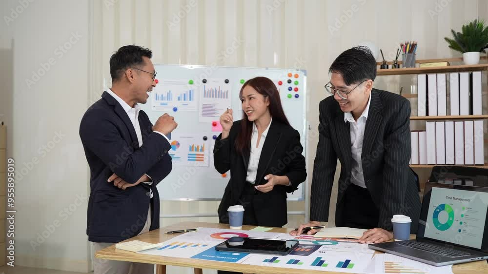 Group of business people discussing brainstorming and working with laptops and marketing analytics documents in conference room about financial strategies. Group of business people discussing brainstorming and working with laptops and marketing analytics documents in conference room about financial strategies.