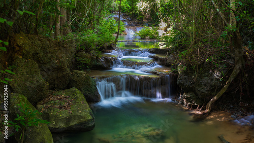 Deep forest waterfall in Thailand. Erawan waterfall National Park Kanjanaburi Thailand.