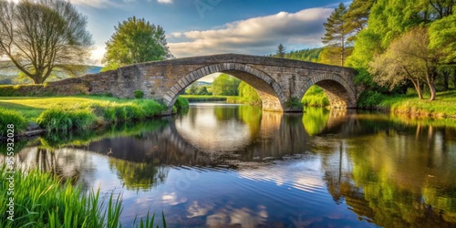 Serene stone bridge blending into rural landscape, overlooking peaceful river , tranquility, rural, bridge, stone, serenity