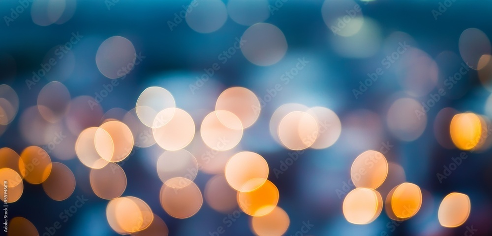 Abstract Blurred City Lights at Night with Bokeh Effect in Blue and Orange Color Scheme, Ideal for Background Texture and Creative Design Projects Abstract Blurred City Lights at Night with Bokeh Effect in Blue and Orange Color Scheme, Ideal for Background Texture and Creative Design Projects