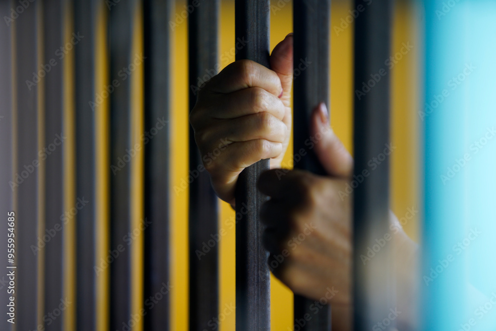 Obraz premium hands in jail
