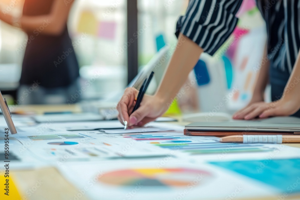 A career advisor assisting with job search strategies. Office with job search resources and strategy outlines A career advisor assisting with job search strategies. Office with job search resources and strategy outlines