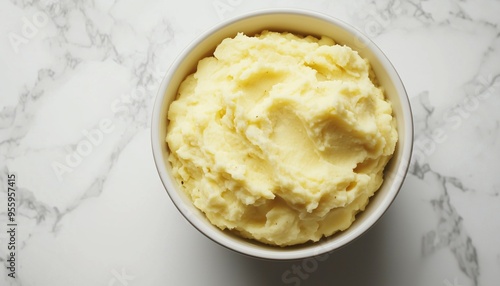 Mashed boiled potatoes or steam peel on ceramic bowl in white table for real food healthy lifestyle
