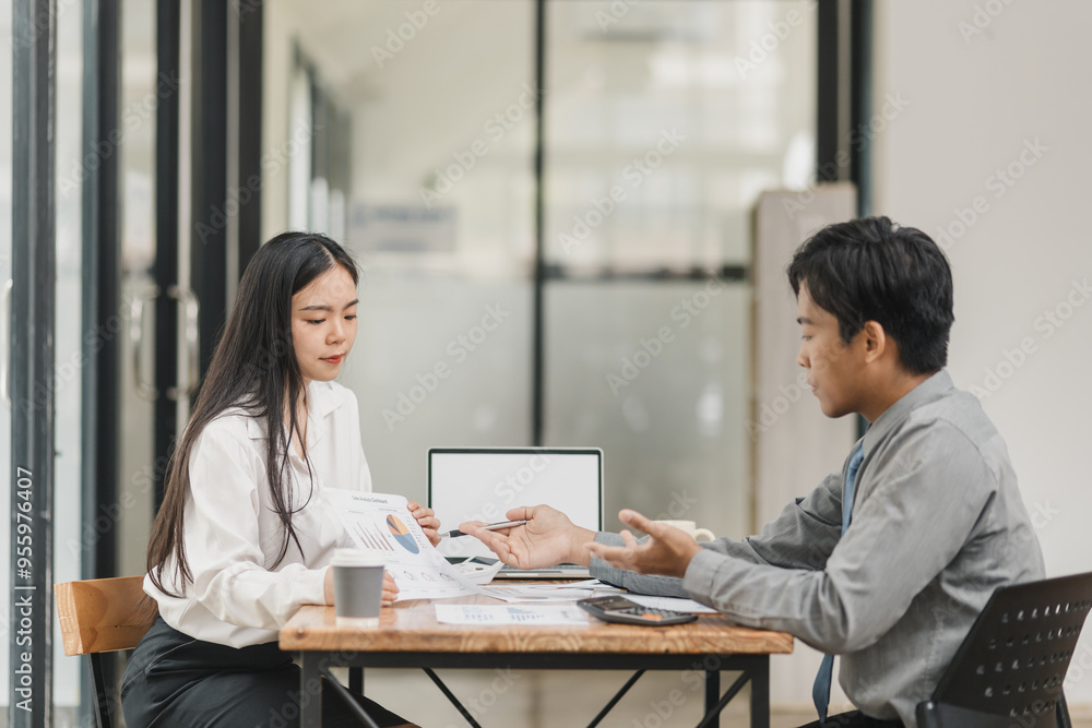 Business financial advisory services concept. Business teamwork and working on digital laptop computer with advisor showing plan of investment to clients at table office. Digital marketing. Business financial advisory services concept. Business teamwork and working on digital laptop computer with advisor showing plan of investment to clients at table office. Digital marketing.