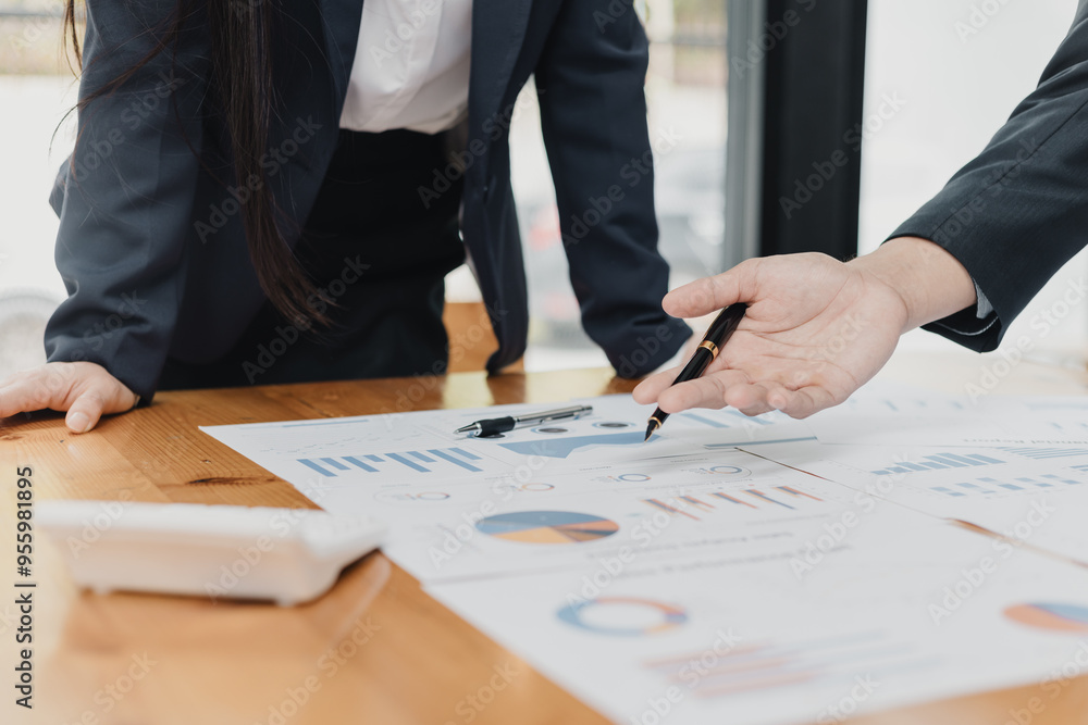 Team of businesswoman working together with analysis report chart in office. Team of businesswoman working together with analysis report chart in office.