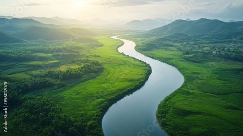 A serene river winding through a green landscape