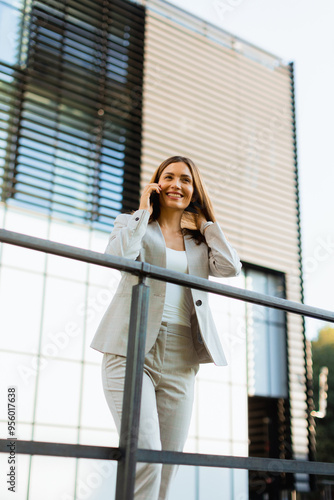 Smiling business woman enjo...
