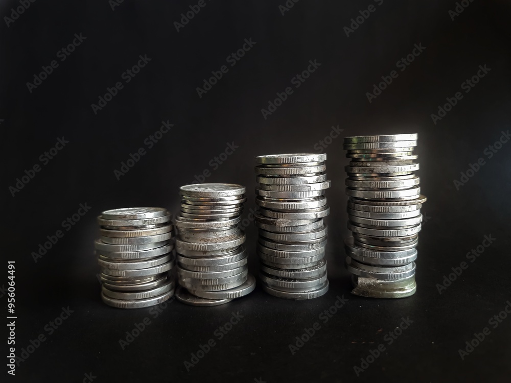 Rupiah banknotes in the form of cents on a black background Rupiah banknotes in the form of cents on a black background