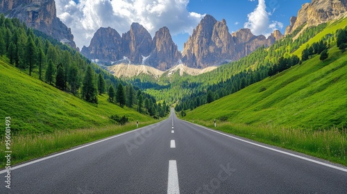 Scenic empty road in Venegia Valley, leading towards towering Dolomite peaks, with lush greenery on both sides. photo