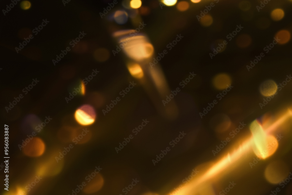 Golden blurred bokeh lights overlay on black background. Glitter sparkle stars Golden blurred bokeh lights overlay on black background. Glitter sparkles light effect Golden blurred bokeh lights overlay on black background. Glitter sparkle stars Golden blurred bokeh lights overlay on black background. Glitter sparkles light effect