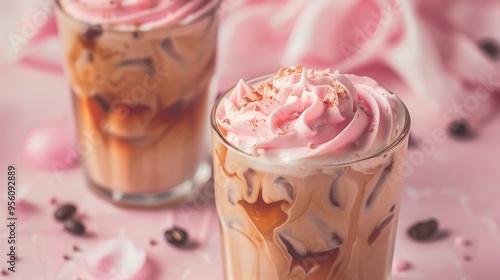 Iced coffee and pink whipped cream