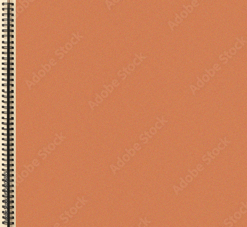 simple orange grainy textured spring notebook background, a space for a text