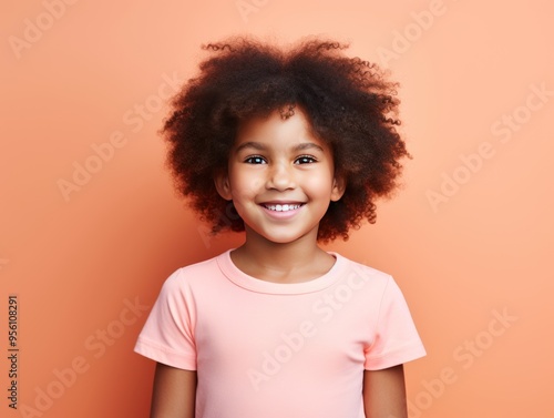 Coral background Happy black american african child Portrait of young beautiful kid Isolated on Background ethnic diversity equality acceptance 