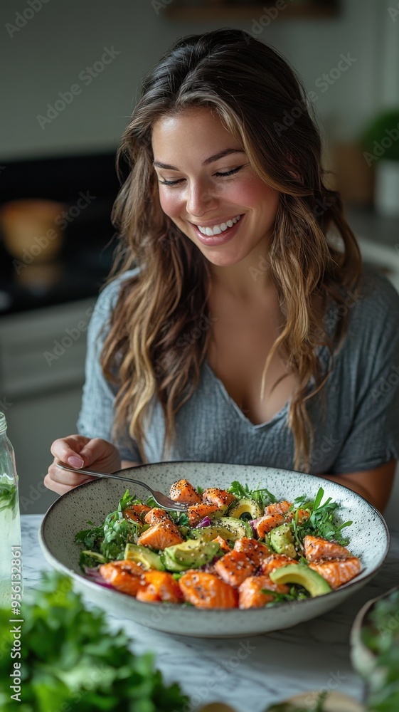 Happy Young woman eating Salted salmon salad with fresh green lettuce,smoked salmon,tomato,Ketogenic,diet lunch bowl,enjoy eat clean vegetables after exercise,Healthy food concept,sport girl. Happy Young woman eating Salted salmon salad with fresh green lettuce,smoked salmon,tomato,Ketogenic,diet lunch bowl,enjoy eat clean vegetables after exercise,Healthy food concept,sport girl.