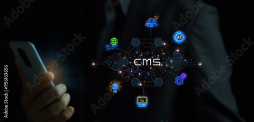 Wallpaper Mural CMS, Content management system concept for business website management. Businessman showing glowing neon line of content management system icons on virtual screen. Torontodigital.ca