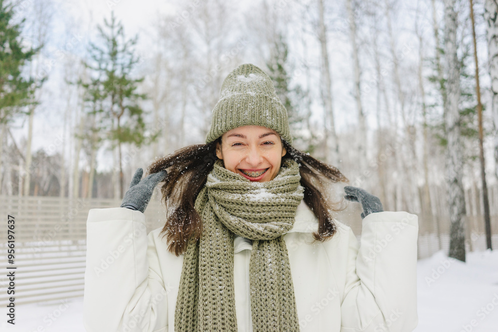 Happy woman tossing hair in winter Happy woman tossing hair in winter