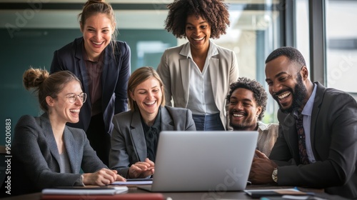 A group of professionals gathered around a laptop, excitedly discussing a new projects potential, showing enthusiasm and teamwork.