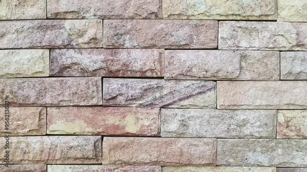 The wall is decorated with small brick blocks with a beautiful stone pattern. The wall is decorated with small brick blocks with a beautiful stone pattern.