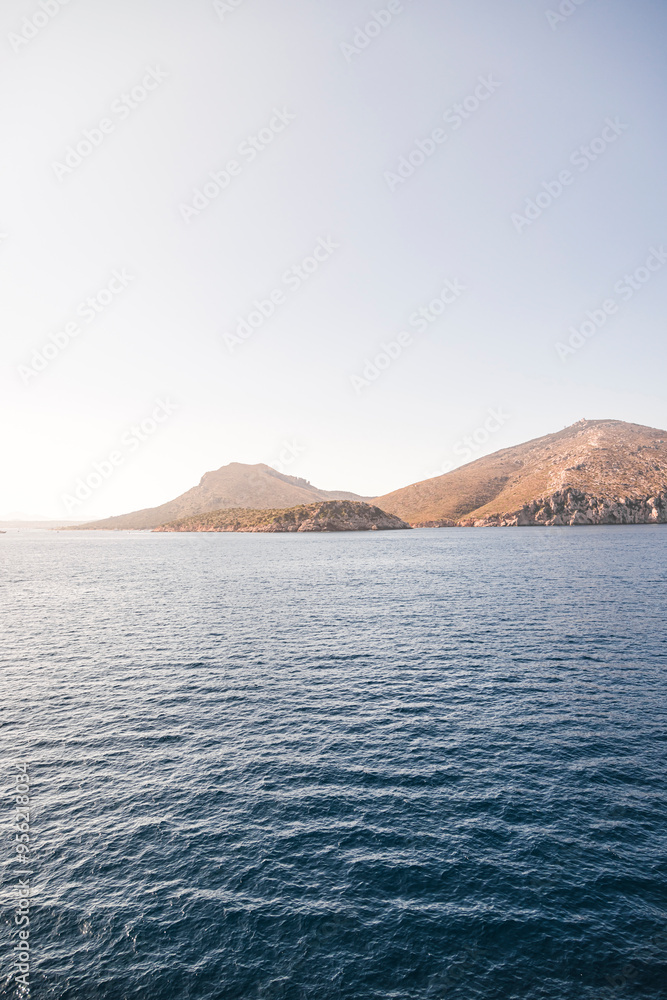Scenic view of Corsica island on sea under clear sky Scenic view of Corsica island on sea under clear sky