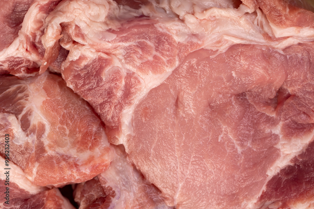 a sliced piece of pork meat from the neck a sliced piece of pork meat from the neck