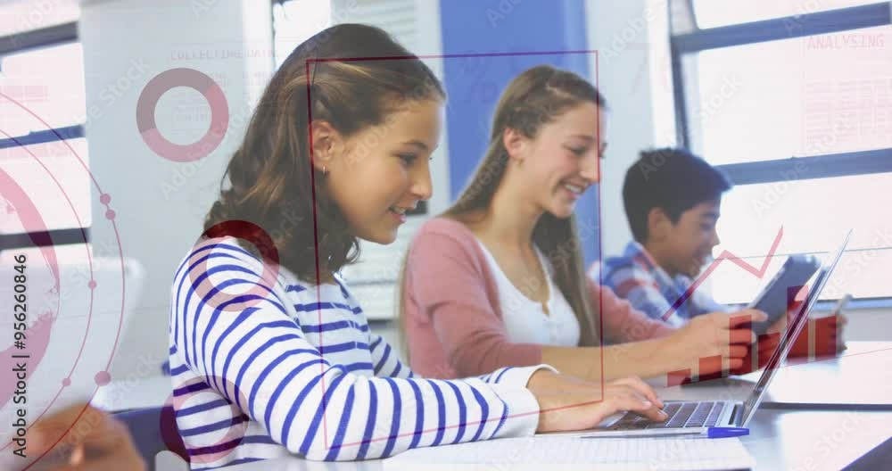 Students using laptops in classroom with data analysis animation over them Students using laptops in classroom with data analysis animation over them
