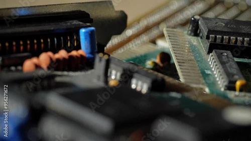 Old video cards, network cards and motherboards close-up