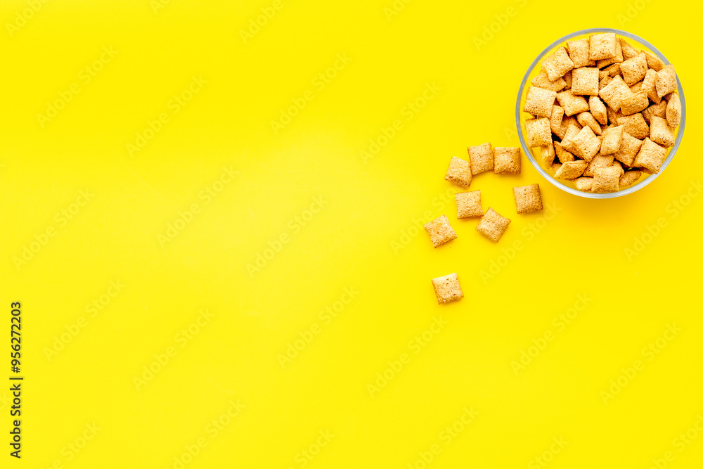 cereals, oatflakes and cornflakes for healthy breakfast on yellow background top view mock up cereals, oatflakes and cornflakes for healthy breakfast on yellow background top view mock up